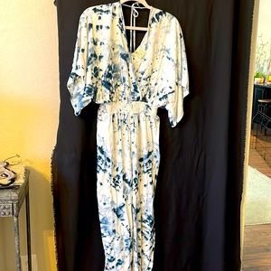 Japna size S, adorable jumpsuit. I’ve never worn it, but the tags are not on it.